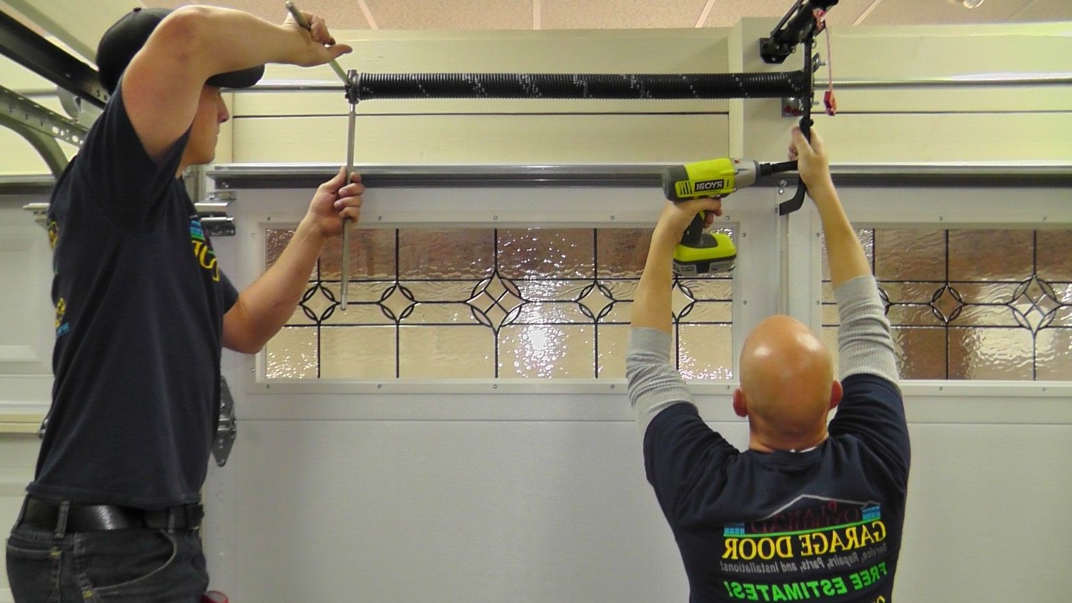 door-doctor-repairs-working Five Signs You Need a Garage Door Tune-Up | Automated Door Systems